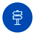 Alquiler Icono circular azul con el dibujo de una señal de tráfico blanca en la que se ven dos flechas direccionales en lo alto de un único poste.