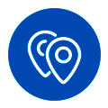 multiubicación Dos iconos de chinchetas superpuestas dentro de una insignia circular azul con un borde blanco
